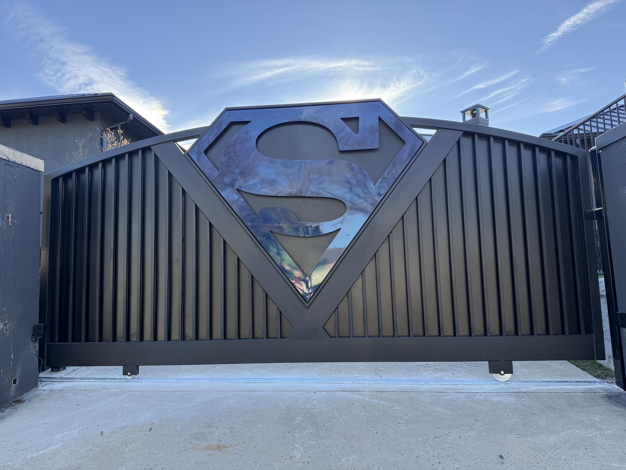 Shaquille O'Neal Channels Superman with Custom "S" Shield Gate at Texas Home